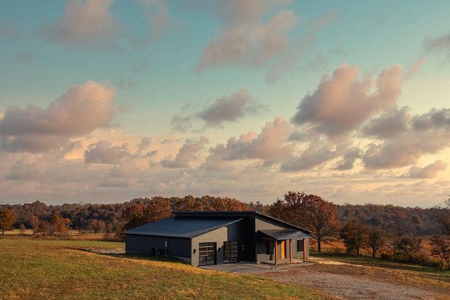 view of property exterior at dusk