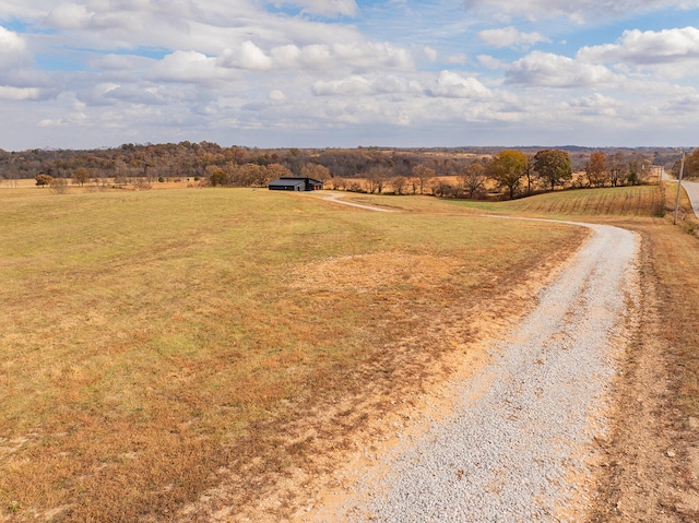 view of street featuring a rural view