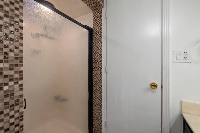 bathroom featuring vanity and walk in shower