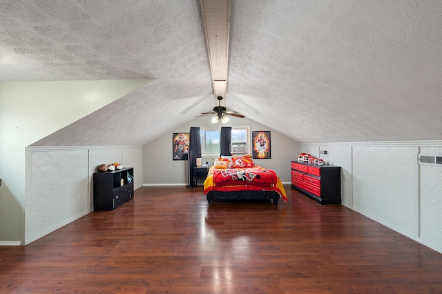 bedroom with lofted ceiling, cooling unit, dark hardwood / wood-style flooring, a textured ceiling, and ceiling fan