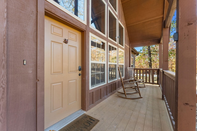 doorway to property with covered porch