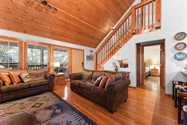 living room with wooden ceiling, high vaulted ceiling, wood-type flooring, and rail lighting