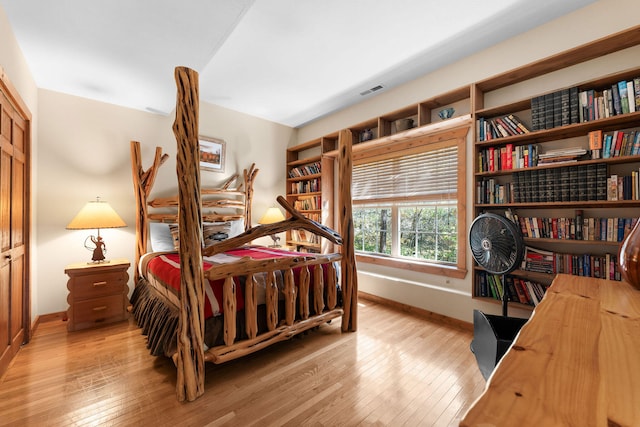 bedroom featuring light wood-type flooring