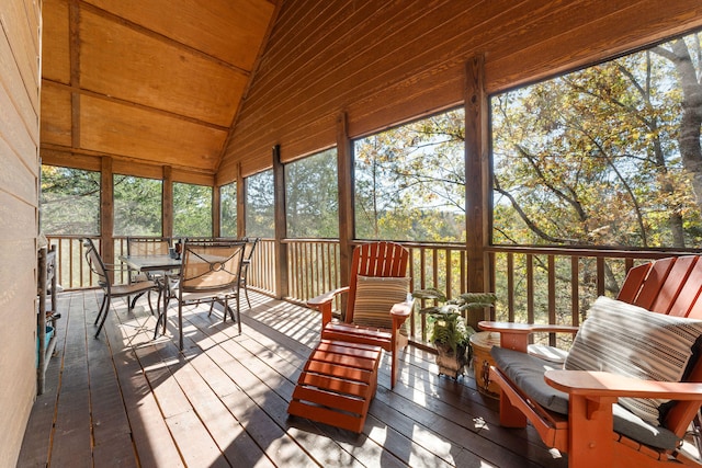 sunroom / solarium with wooden ceiling and vaulted ceiling