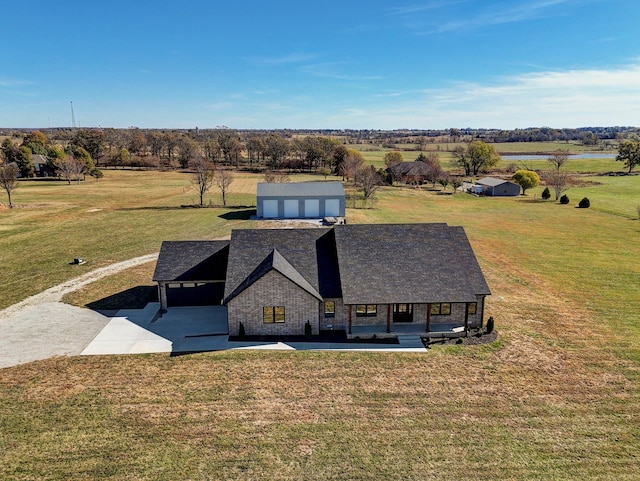 bird's eye view with a rural view and a water view