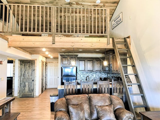 living room featuring light wood-type flooring