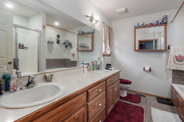 full bathroom featuring vanity, toilet, tile patterned floors, and shower with separate bathtub