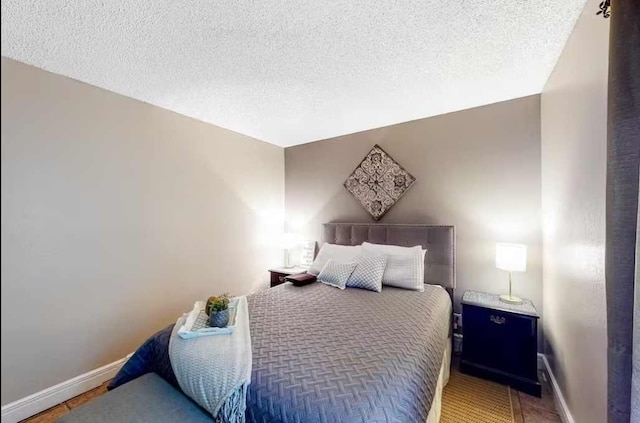 bedroom with a textured ceiling