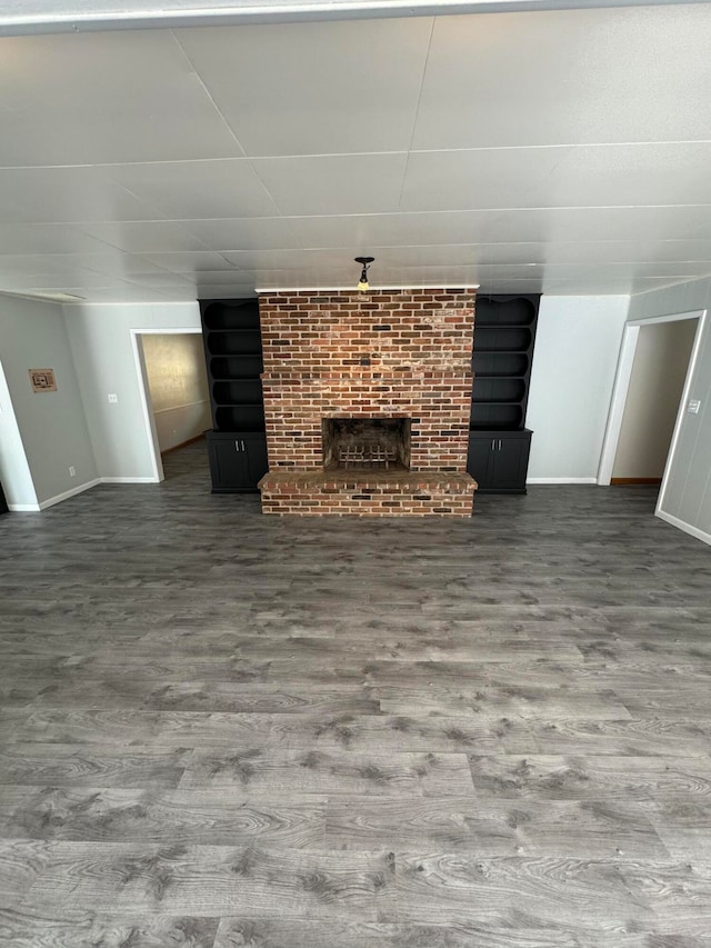 unfurnished living room featuring a fireplace