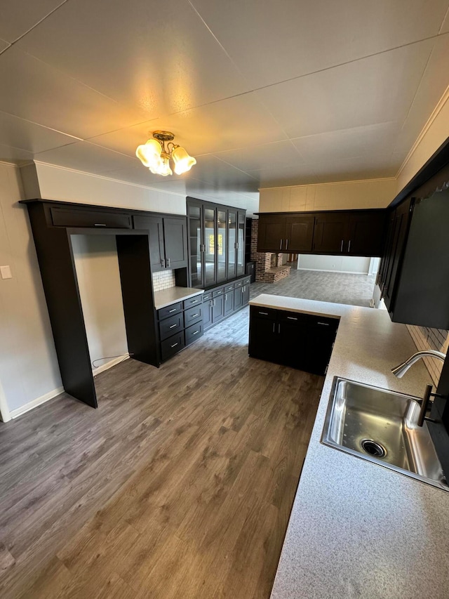 kitchen featuring dark hardwood / wood-style floors and sink