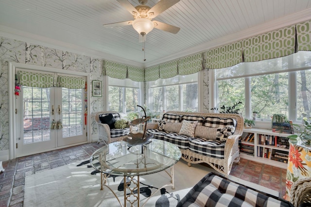 sunroom / solarium featuring wooden ceiling, ceiling fan, and french doors