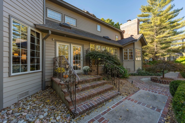 back of house with a patio