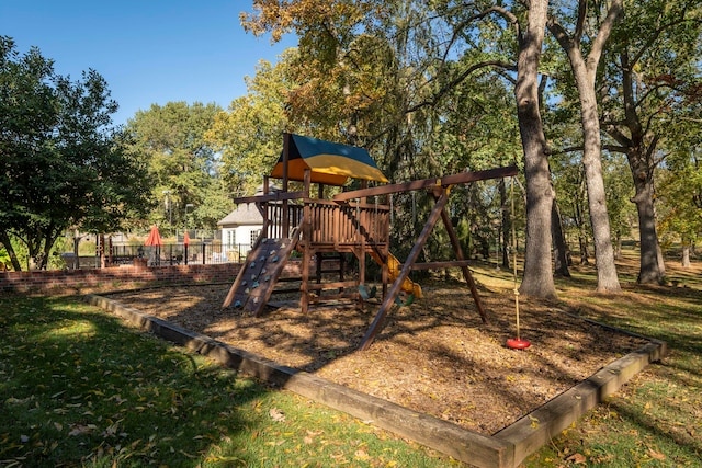 view of play area featuring a lawn