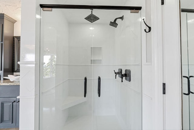 bathroom featuring an enclosed shower