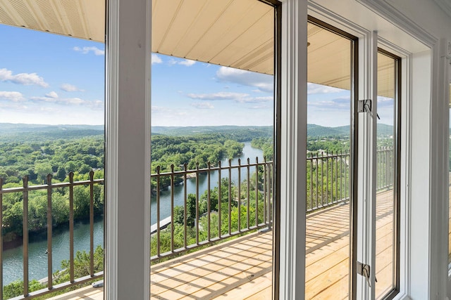 balcony featuring a water view