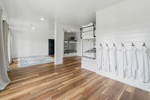 interior space with wood ceiling and hardwood / wood-style flooring