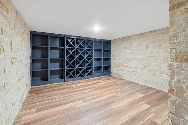 spare room featuring hardwood / wood-style flooring