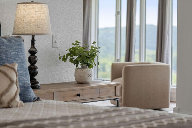 bedroom featuring multiple windows