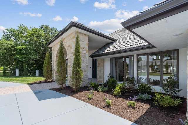 property entrance with a patio