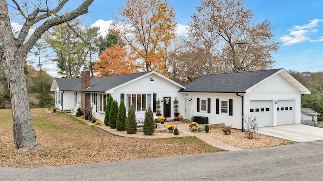 single story home with a garage