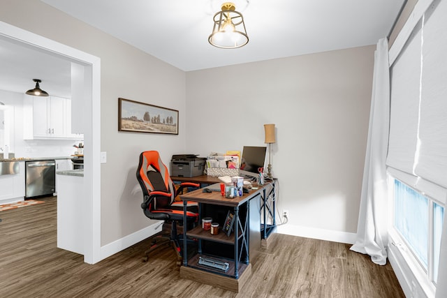 office area with hardwood / wood-style floors