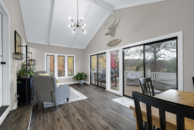 sunroom / solarium with a chandelier and vaulted ceiling with beams