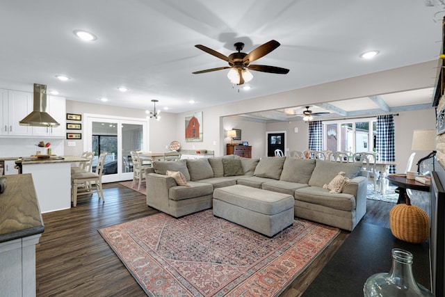 living room with beam ceiling, french doors, ceiling fan with notable chandelier, and dark hardwood / wood-style flooring