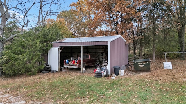 view of outbuilding with a lawn