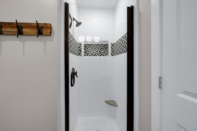 details with a shower with shower door