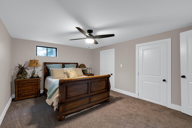 bedroom with dark carpet and ceiling fan