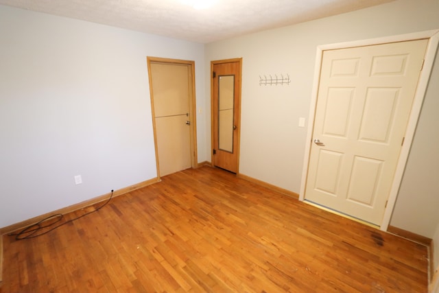 empty room featuring light hardwood / wood-style floors