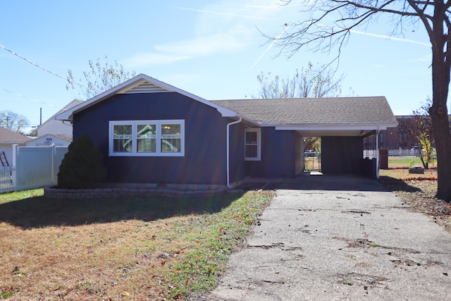 view of front of home with a carport