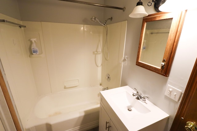 bathroom with bathtub / shower combination and vanity