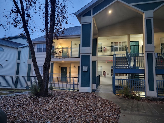 view of front of property with a balcony