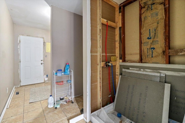 bathroom with tile patterned floors