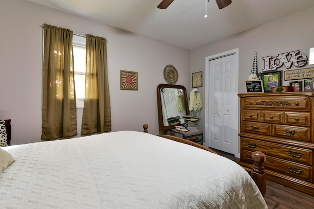 bedroom with hardwood / wood-style floors, ceiling fan, and a closet