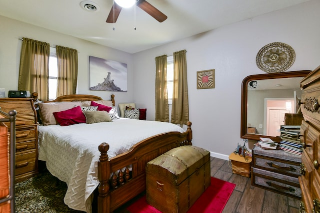 bedroom featuring dark hardwood / wood-style floors and ceiling fan