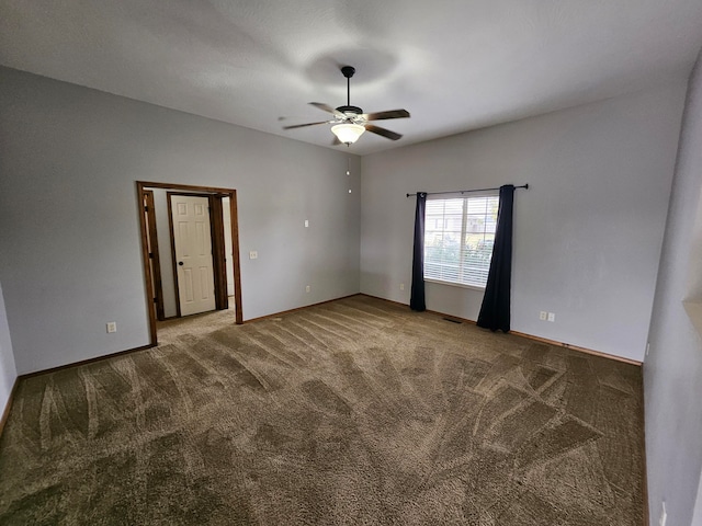 carpeted empty room with ceiling fan