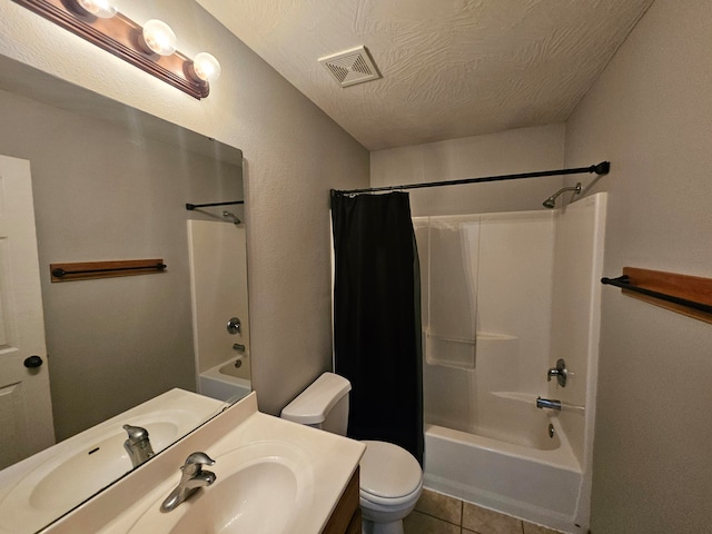 full bathroom featuring shower / bathtub combination with curtain, tile patterned floors, a textured ceiling, toilet, and vanity