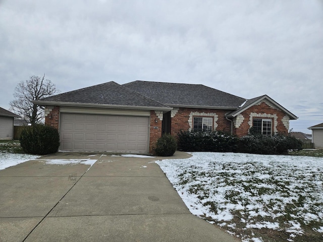 single story home featuring a garage