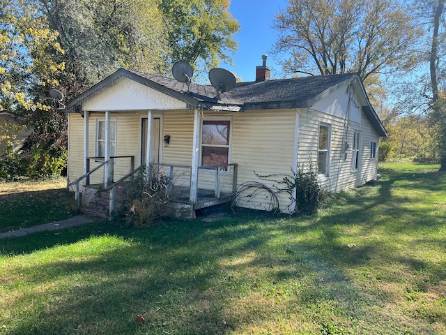 bungalow with a front lawn