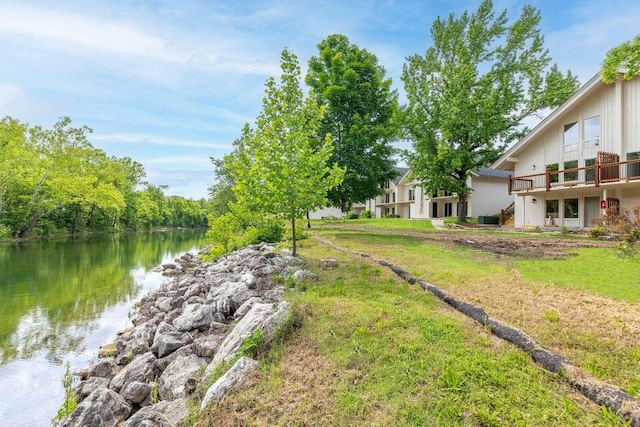 view of yard with a water view