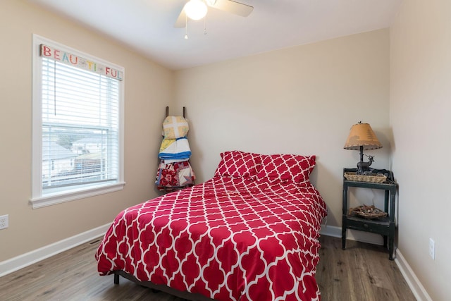 218 Windridge Rd, Branson, MO 65616 - bedroom featuring wood finished floors, baseboards, and a ceiling fan