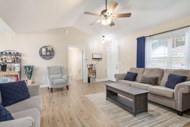 218 Windridge Rd, Branson, MO 65616 - living area featuring lofted ceiling, light wood-style flooring, a ceiling fan, and baseboards