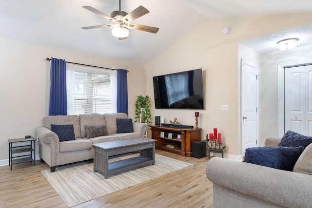 218 Windridge Rd, Branson, MO 65616 - living area featuring vaulted ceiling, light wood-type flooring, ceiling fan, and baseboards