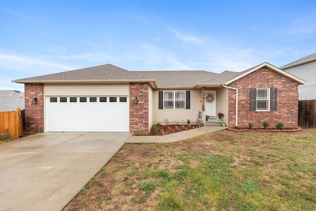 ranch-style home with a garage and a front yard