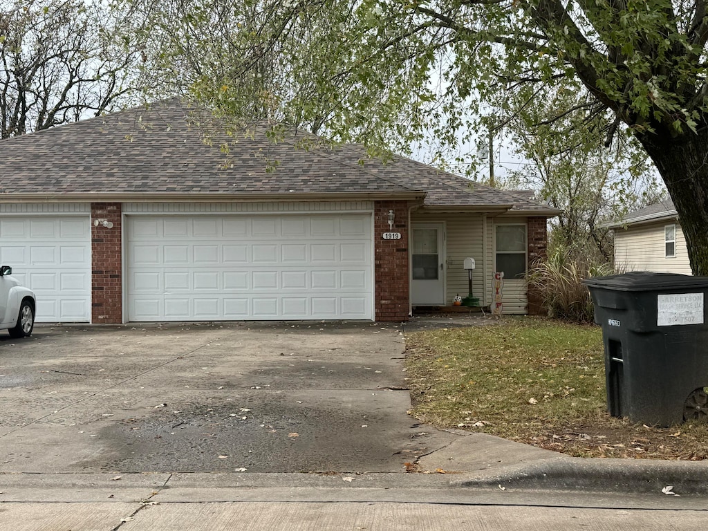 ranch-style house with a garage