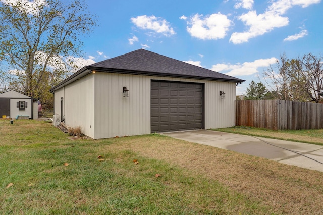 garage with a yard