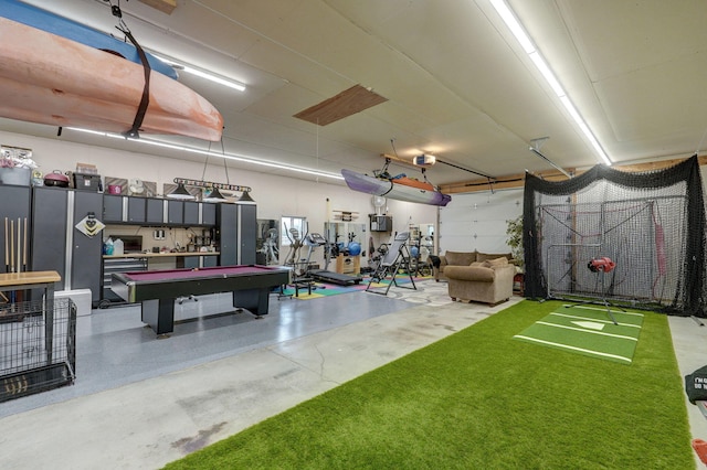 recreation room with billiards and concrete floors