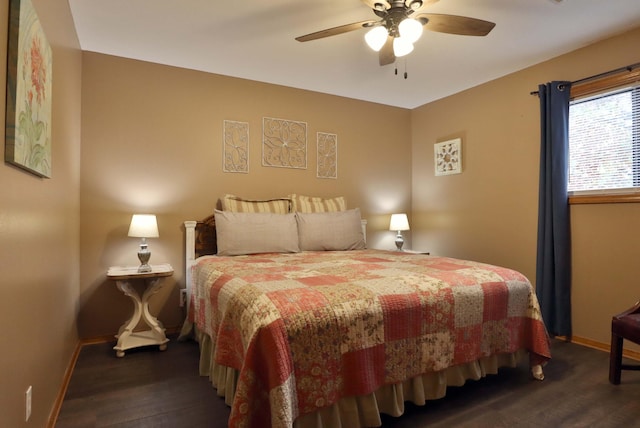 bedroom featuring dark wood-type flooring and ceiling fan